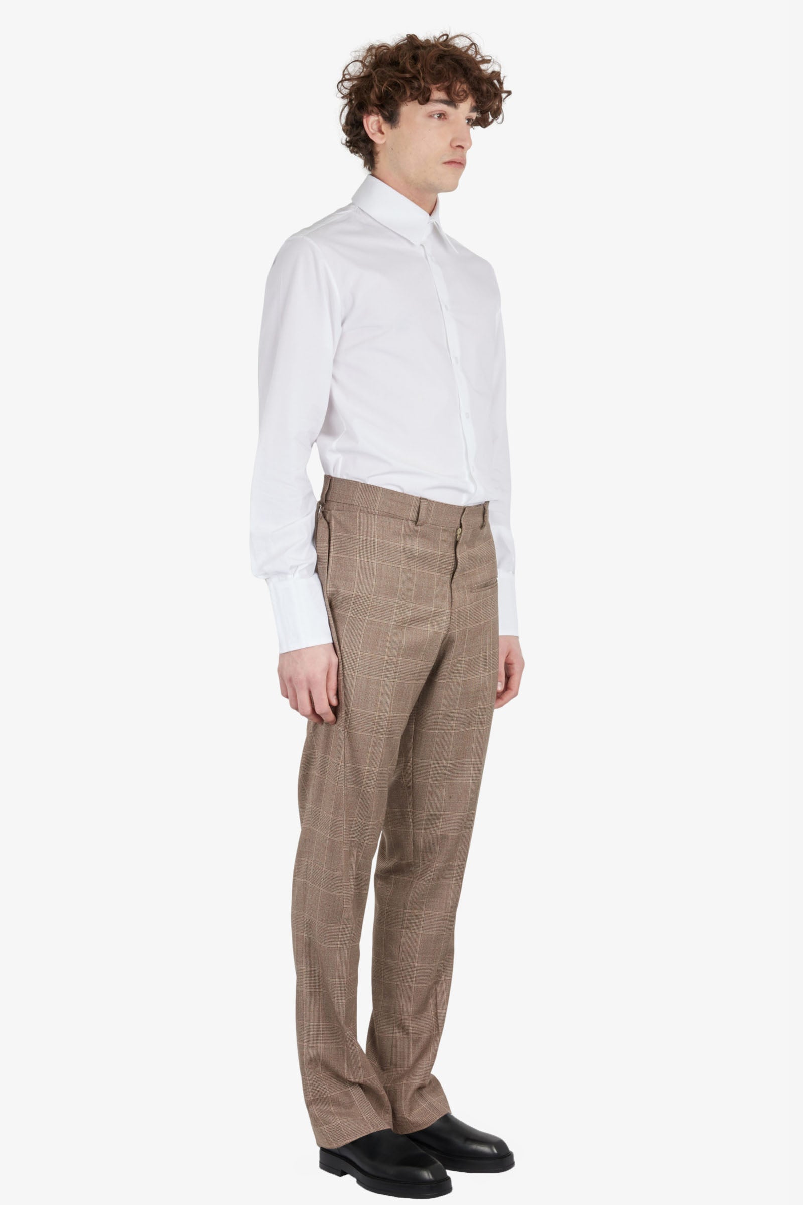 Tailored trousers with strapped falling pocket