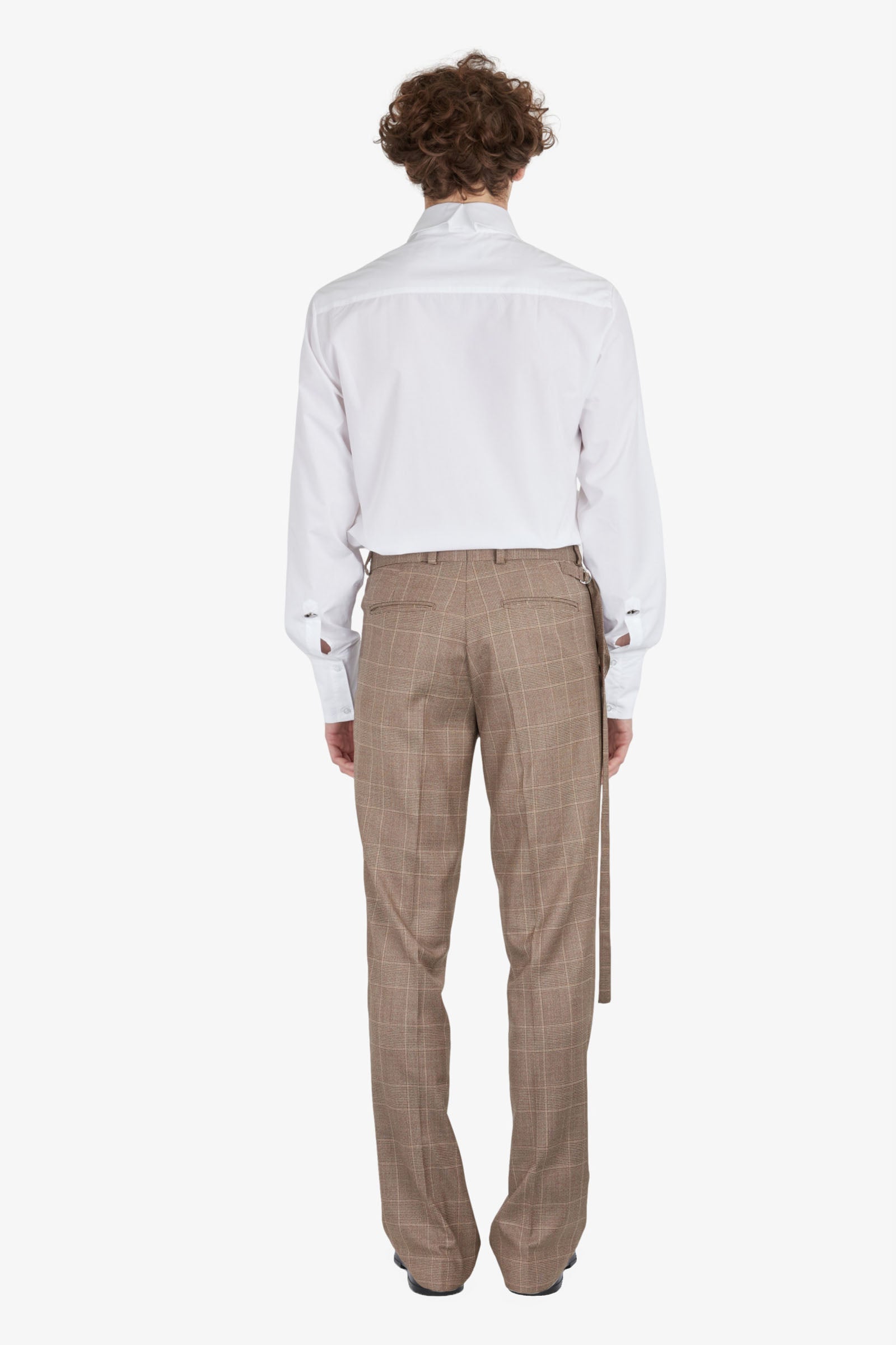 Tailored trousers with strapped falling pocket