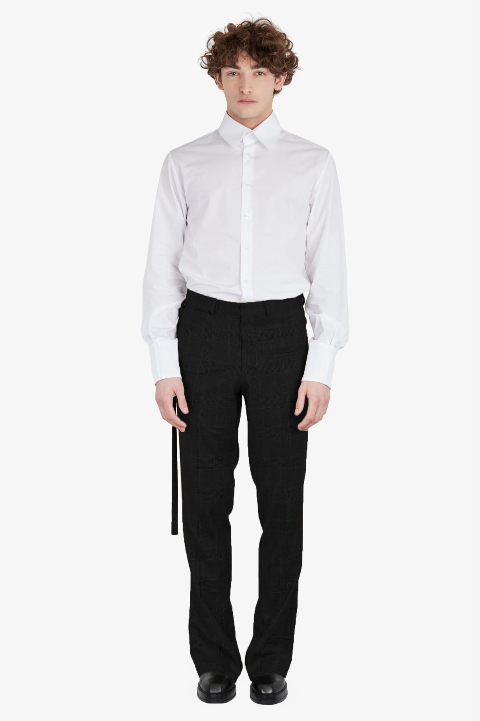 Tailored trousers with strapped falling pocket