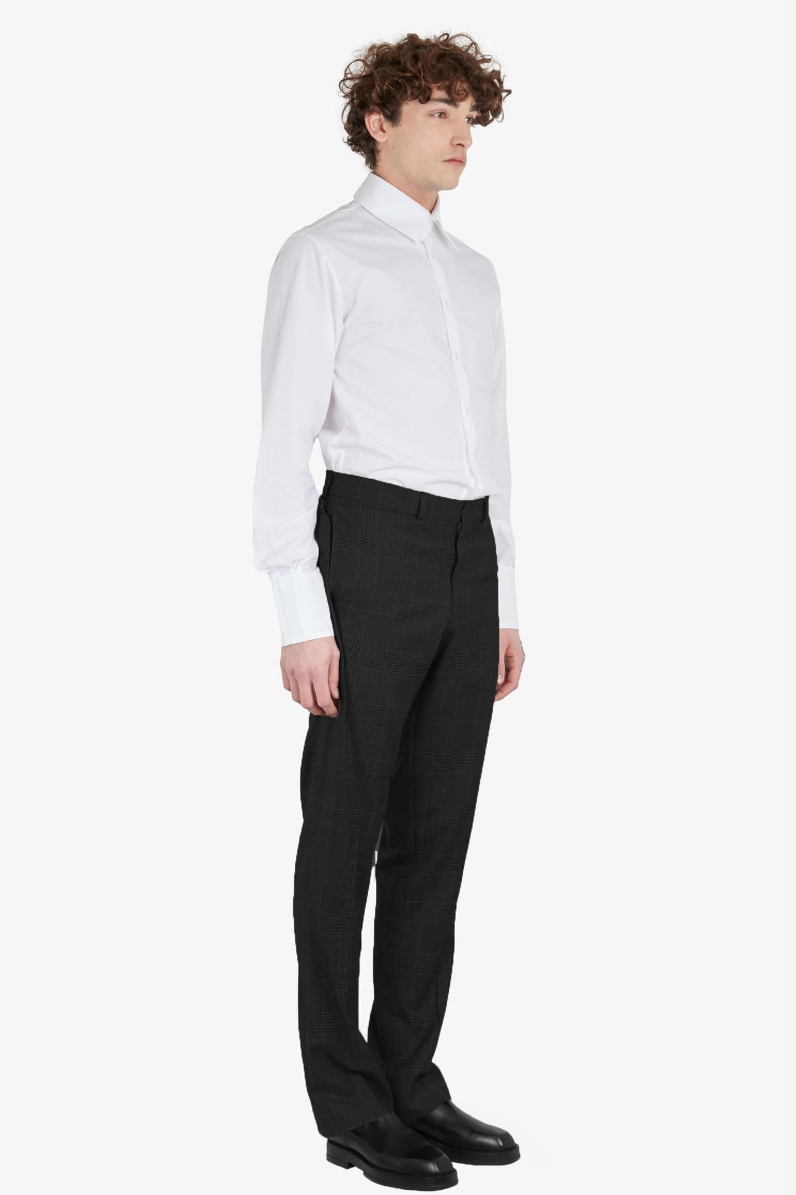 Tailored trousers with strapped falling pocket